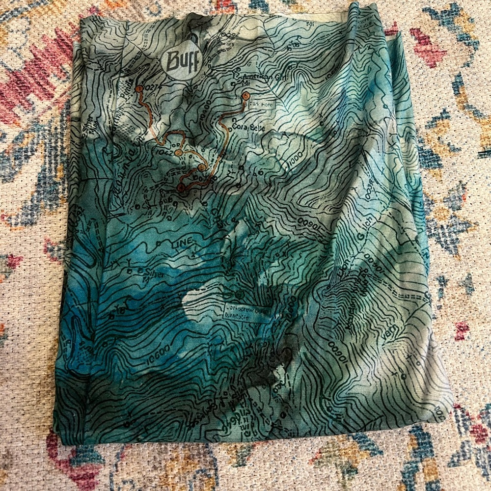 Topographic teal buff